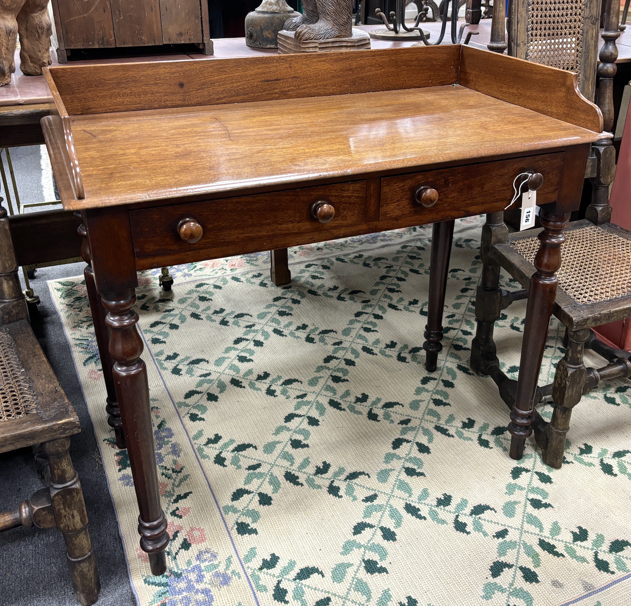 A mid Victorian mahogany two drawer side table, width 91cm, depth 47cm, height 84cm